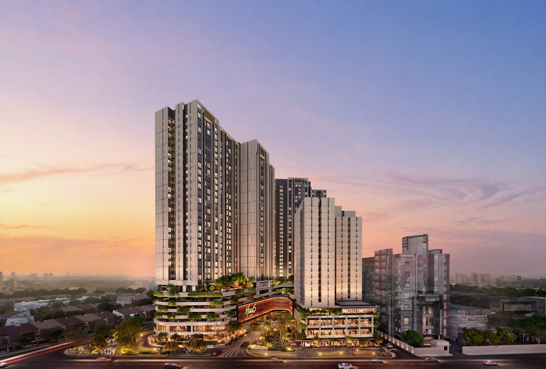 Haus on 15 at dusk: two residential towers above a planted podium and street-front shops, SS15 around them. Artist's impression.